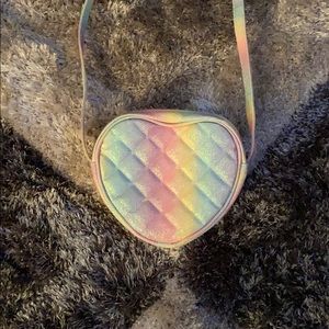 I am selling a rainbow glittery purse